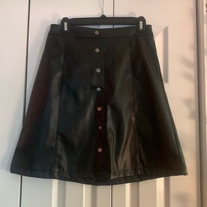 Cute black leather skirt with buttons down the front